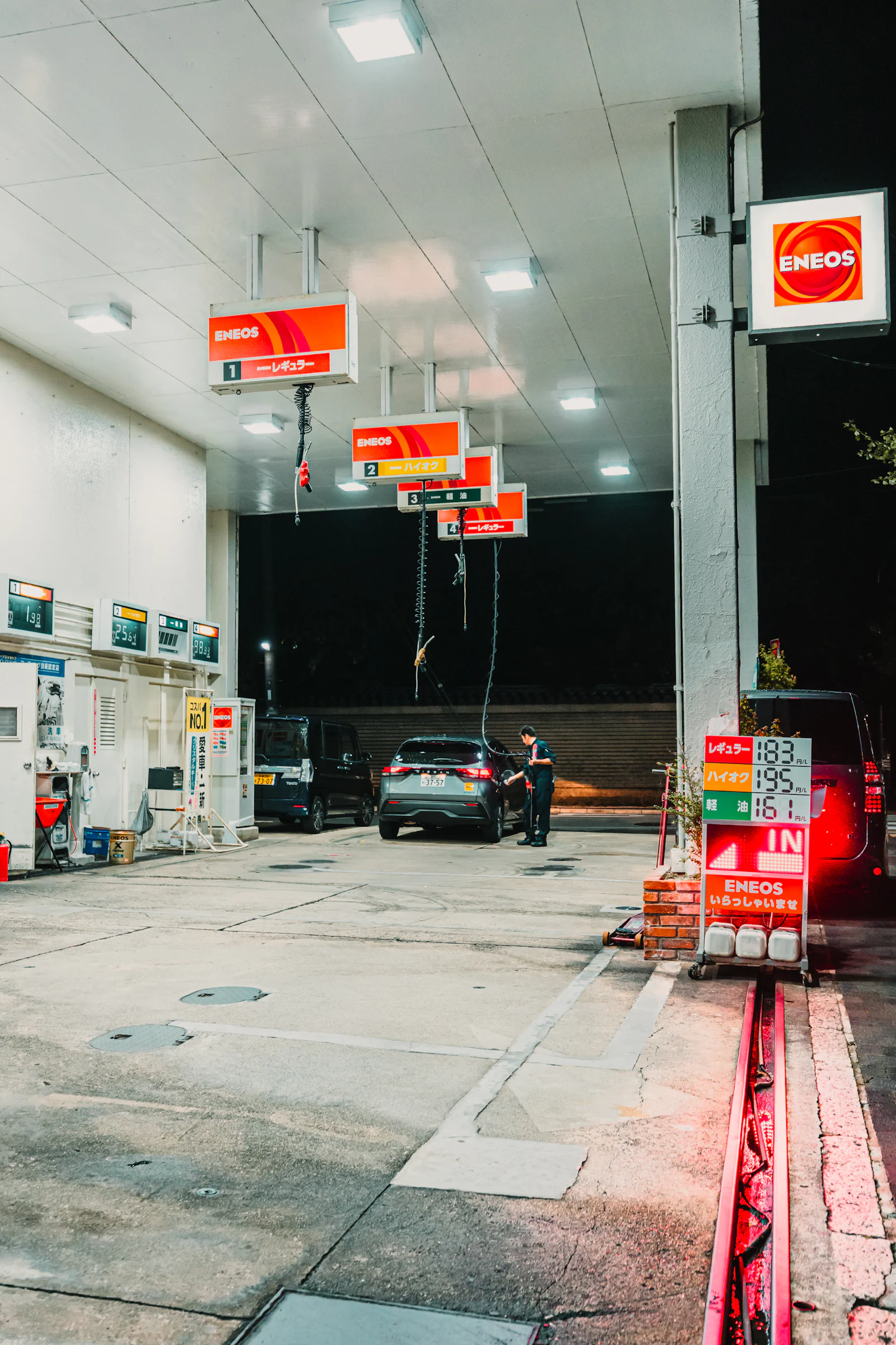 Brightly lit gas station canopy at night