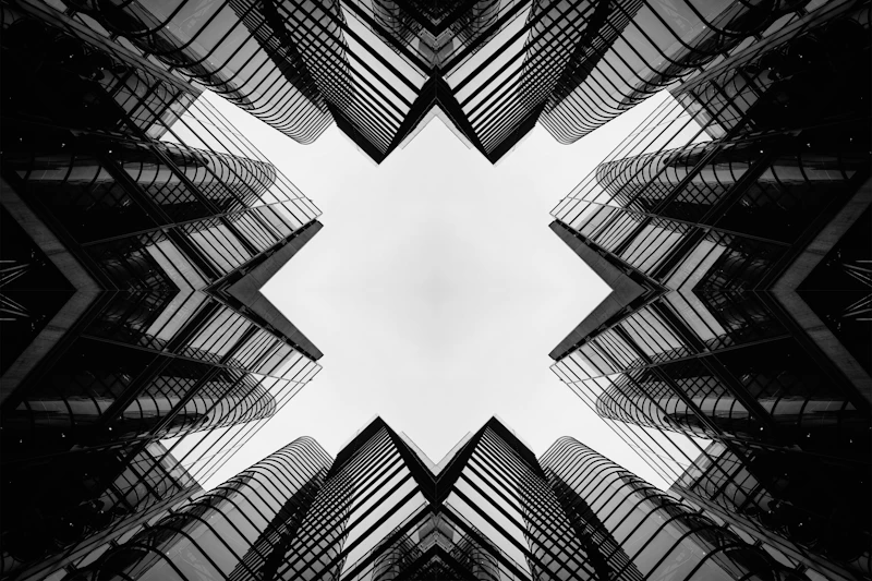 Symmetrical pattern of modern buildings, evoking corporate structure