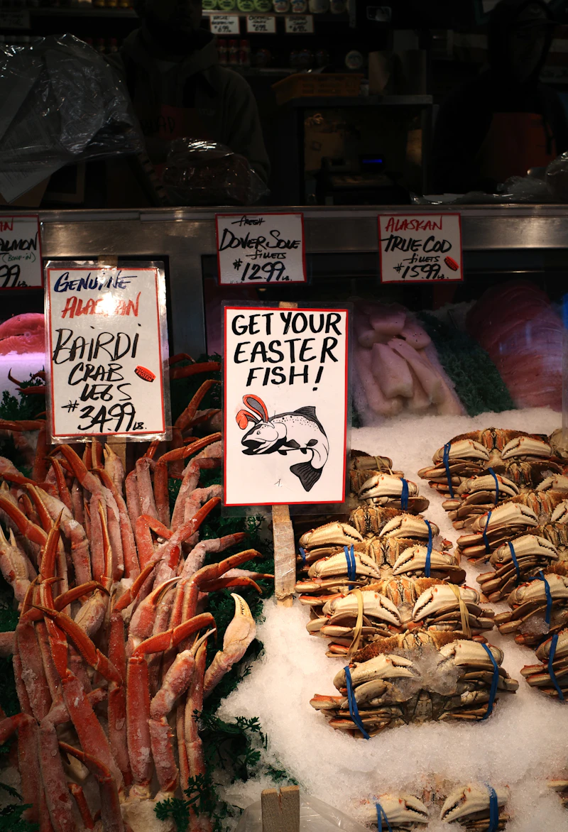 Whole crab and crab legs arranged on ice