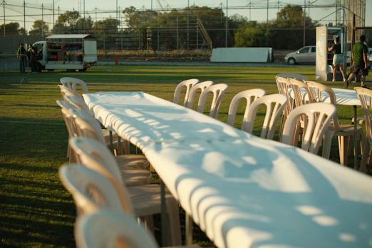 Long table and chairs set up outdoors