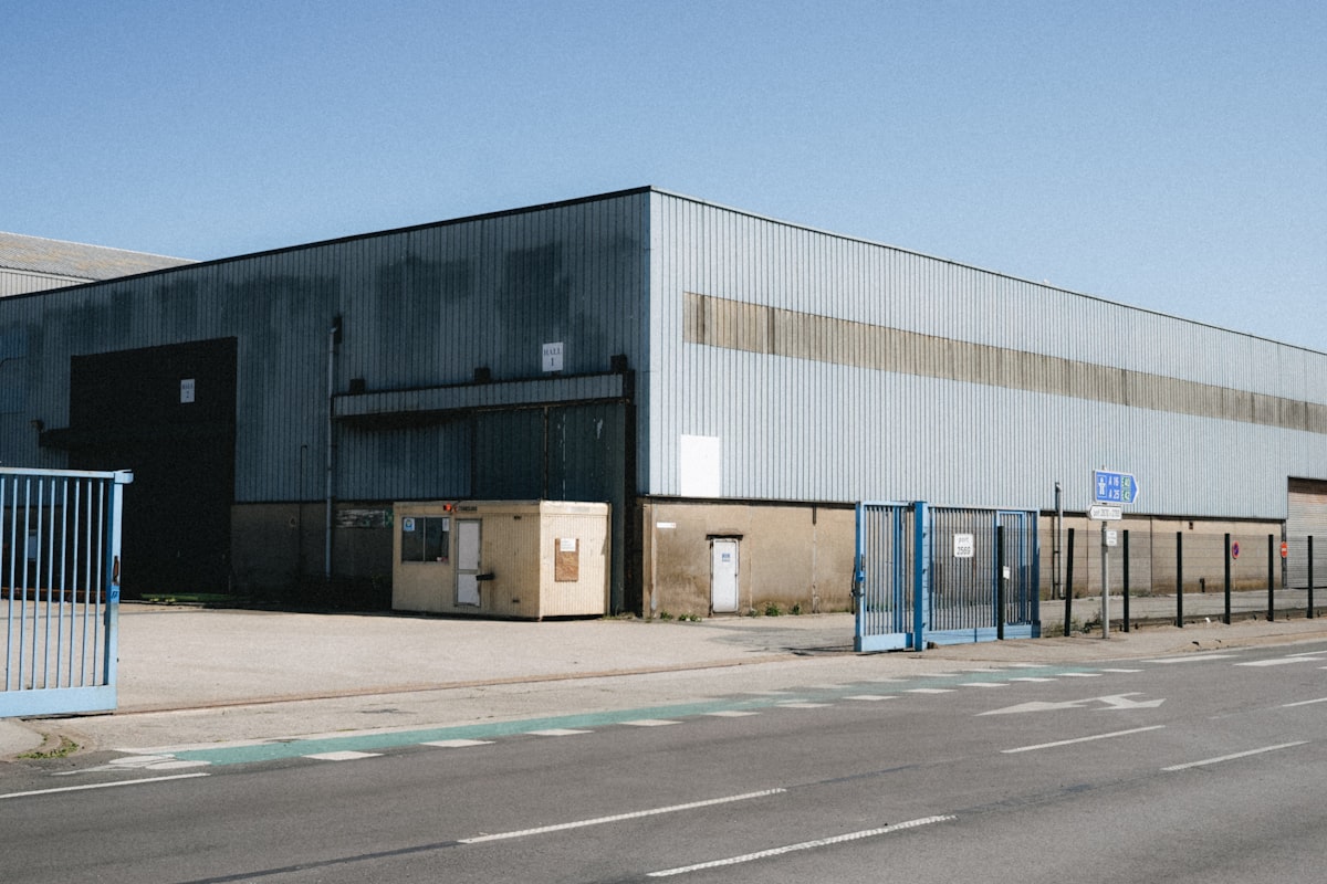Industrial warehouse with access gates and loading area