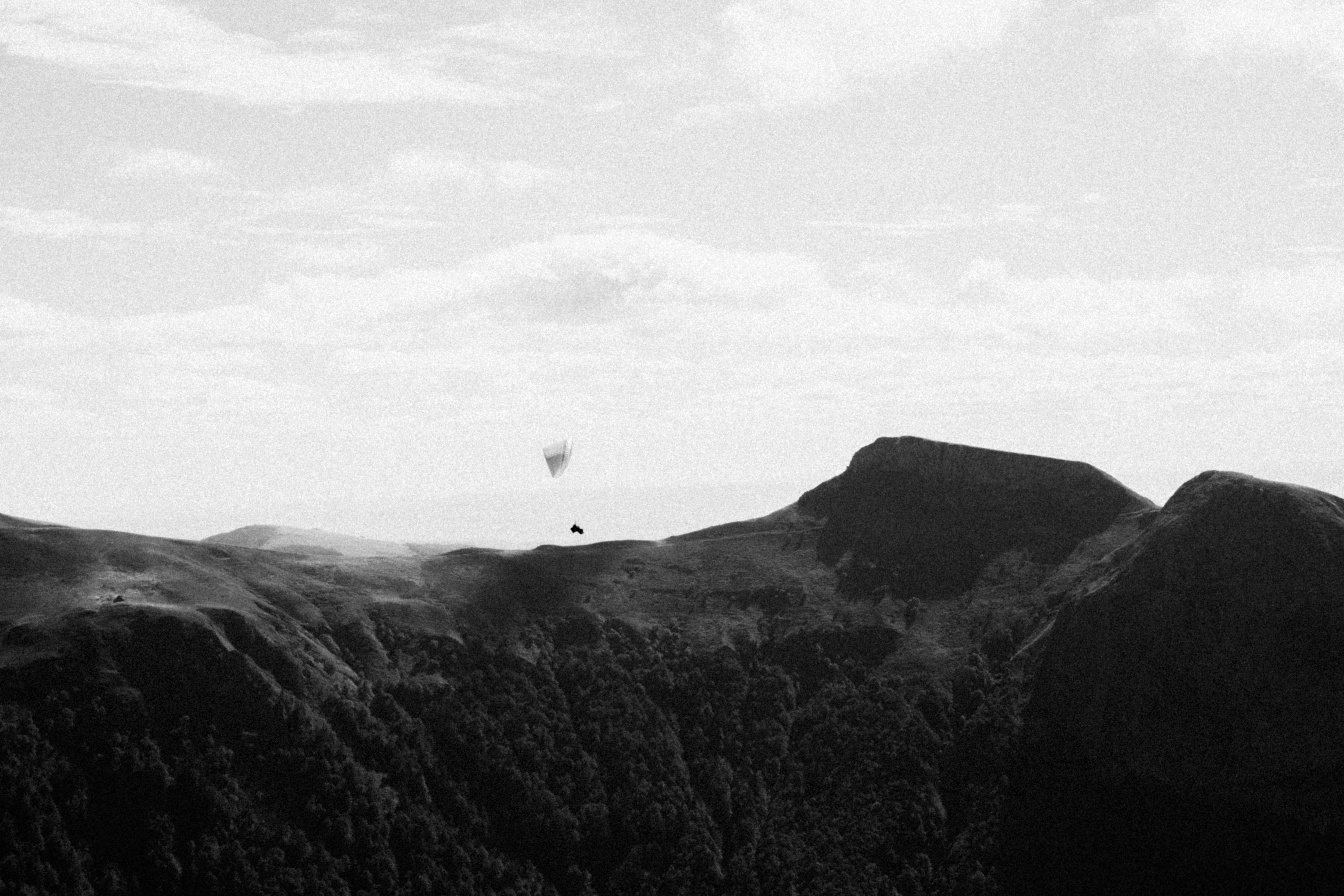Hot air balloons over a mountain range