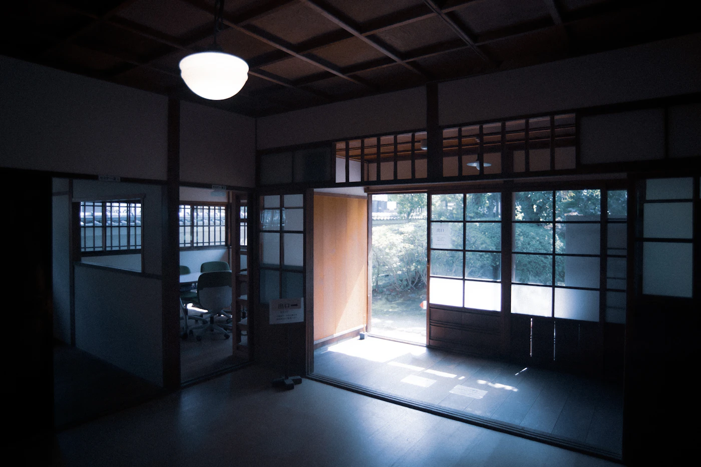Traditional Japanese room with garden view through sliding doors