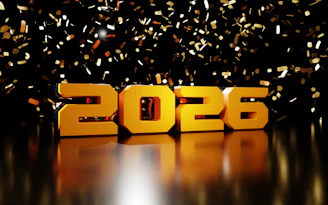 Golden 2026 numbers with falling confetti