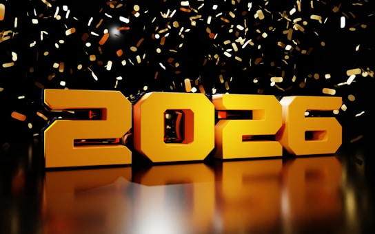 Golden 2026 numbers with falling confetti