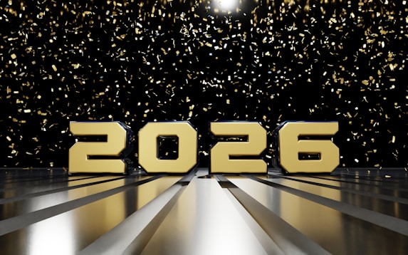 Golden 2026 text with falling confetti