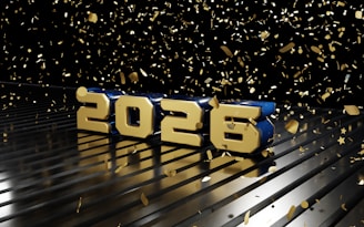 Golden 2026 numbers with falling confetti