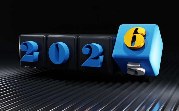The numbers 2025 and 2026 on rotating cubes
