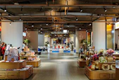 Interior view of a well-lit retail store with merchandise displays