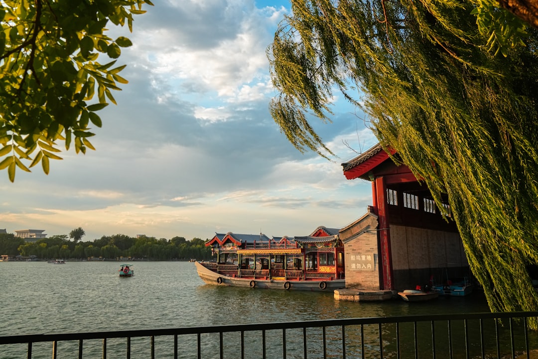Traditional hand-rowed boat on serene lake