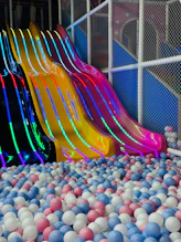 Colorful slides over a ball pit