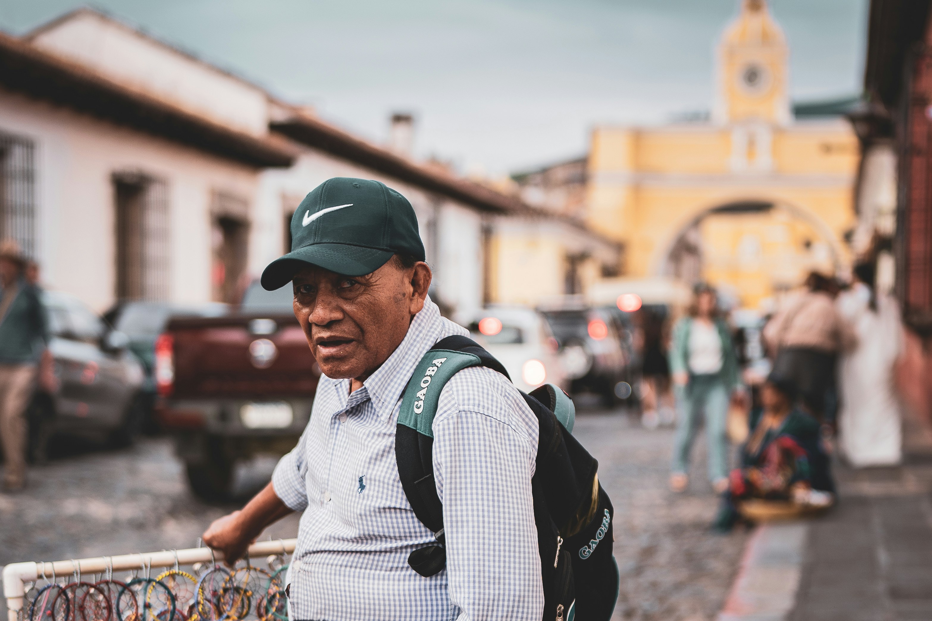 Man in a baseball cap on a street