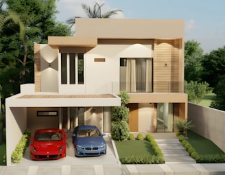 Modern house with two cars parked in driveway.