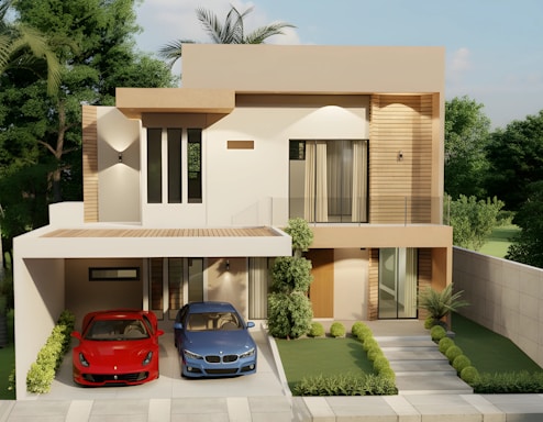 Modern house with two cars parked in driveway.
