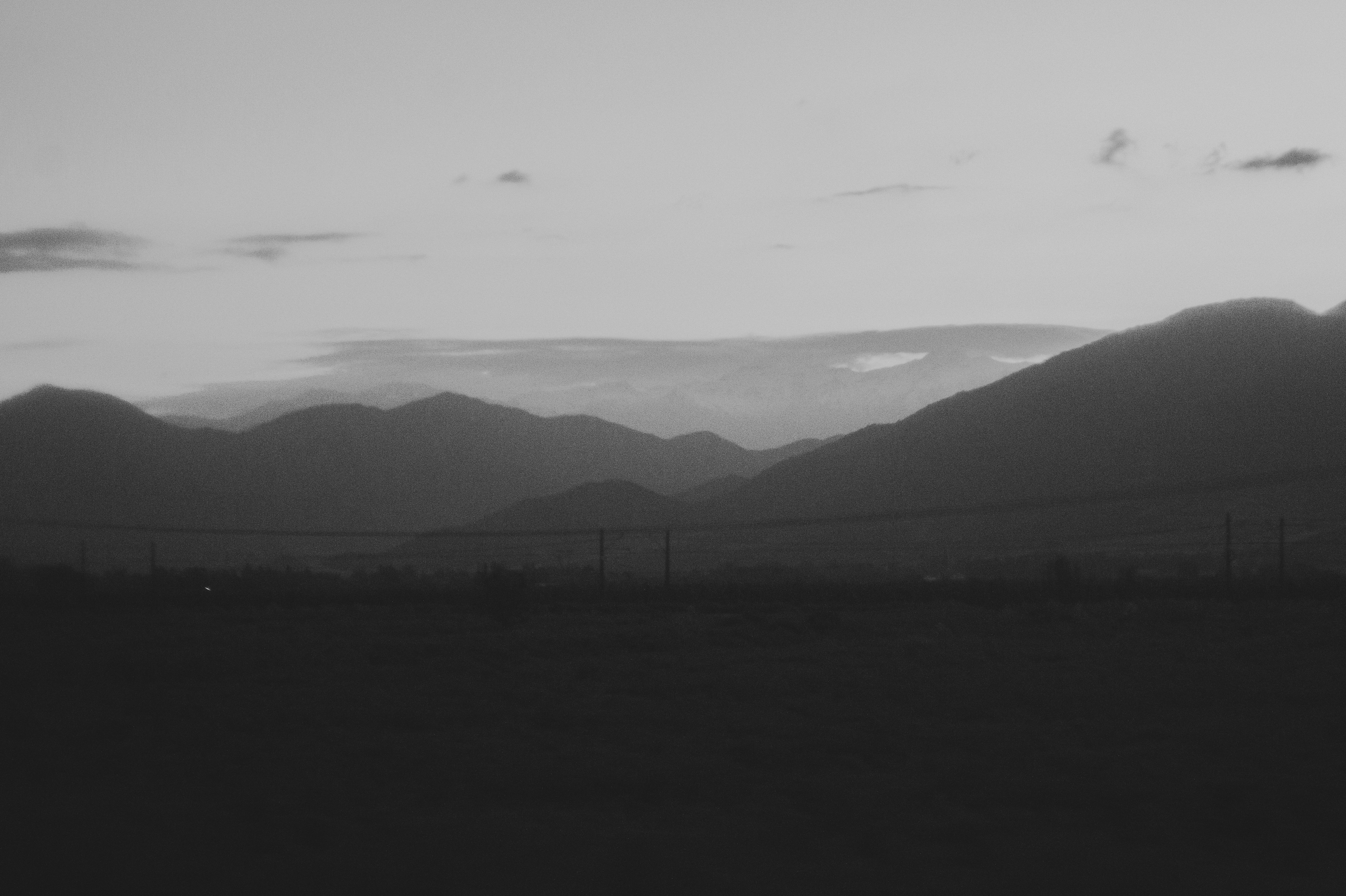 Silhouetted mountains against a twilight sky