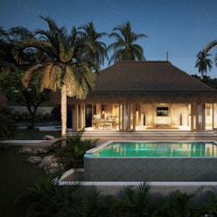 Tropical villa with pool at twilight