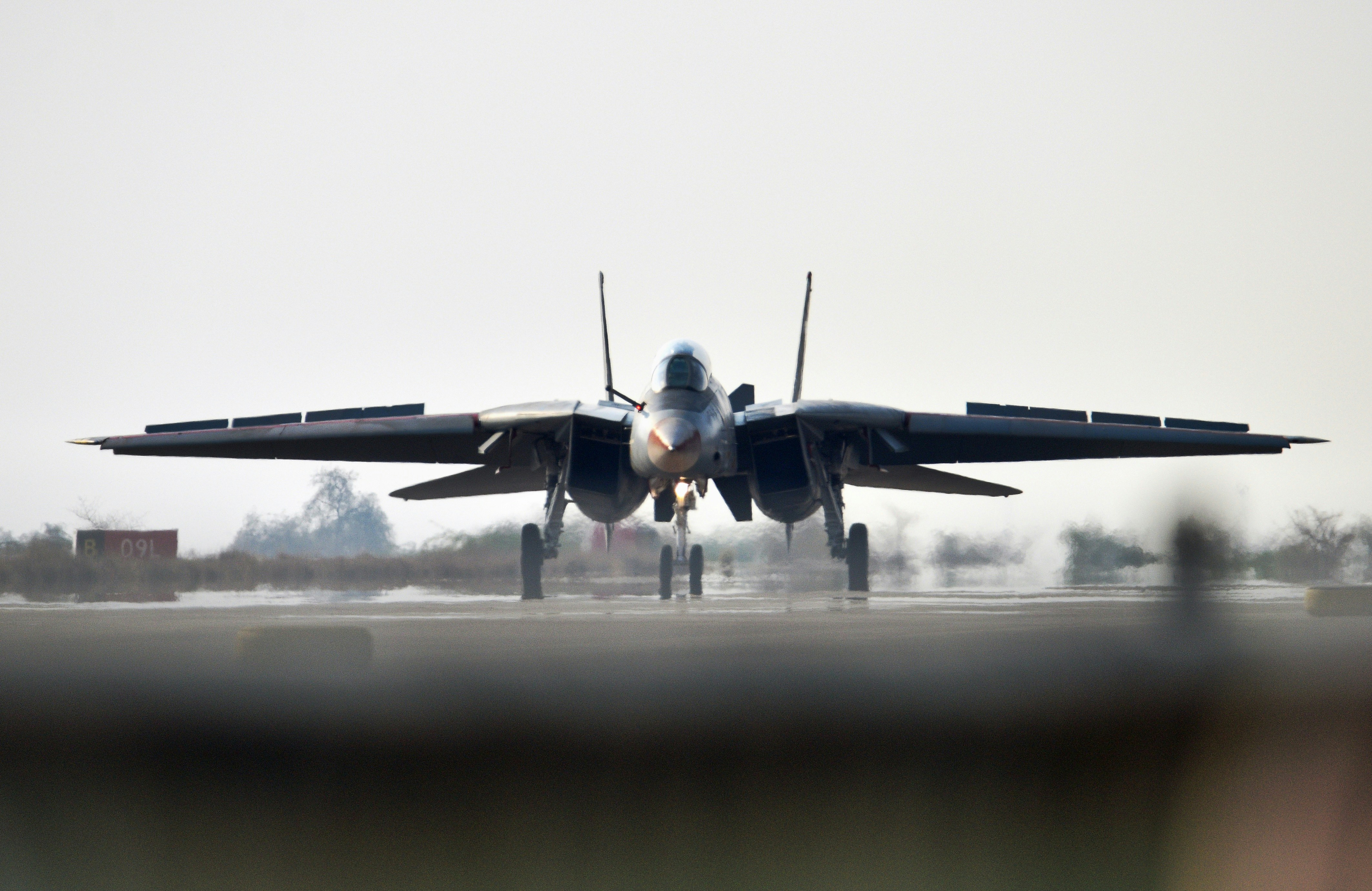 F-14 tomcat fighter jet on runway
