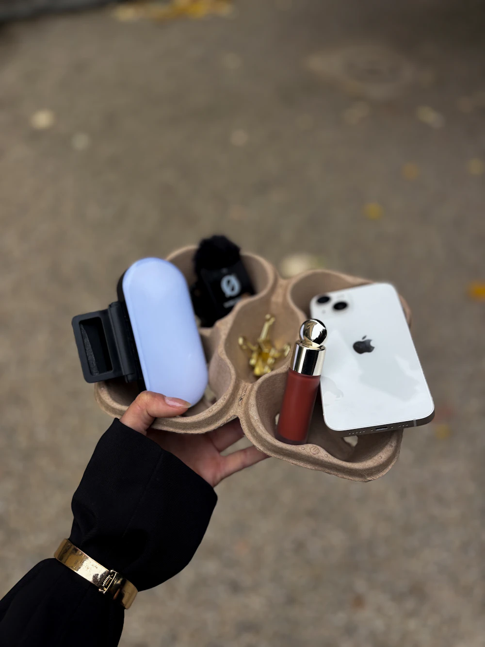 Phone, light and products set up for a UGC product video