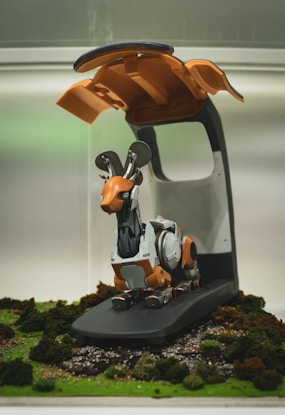 Robotic deer on a miniature forest treadmill.