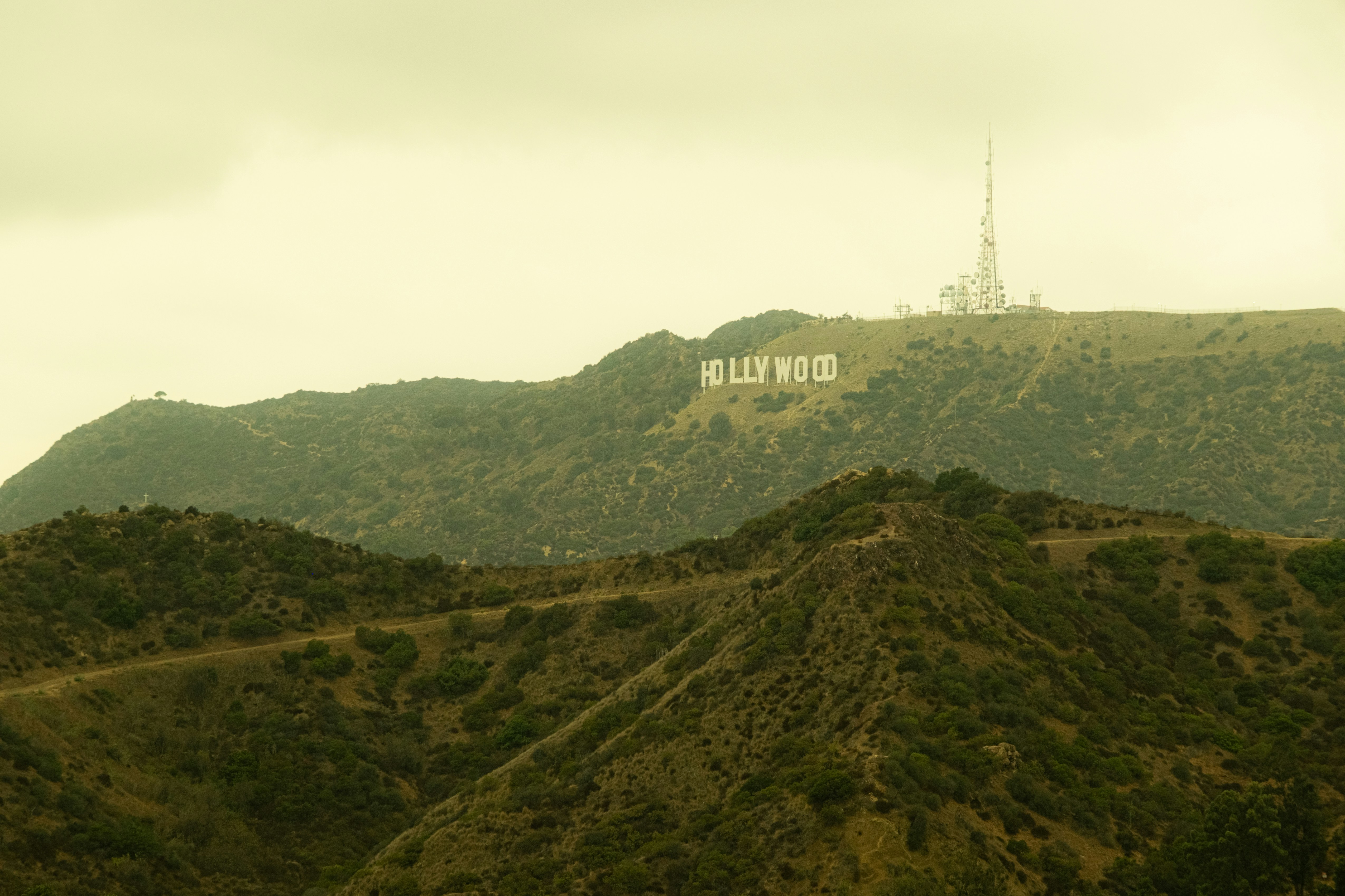 The iconic hollywood sign on a hill.