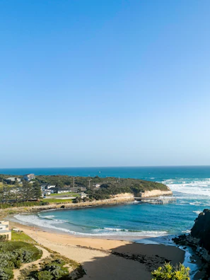 Coastal town with a bay and ocean waves