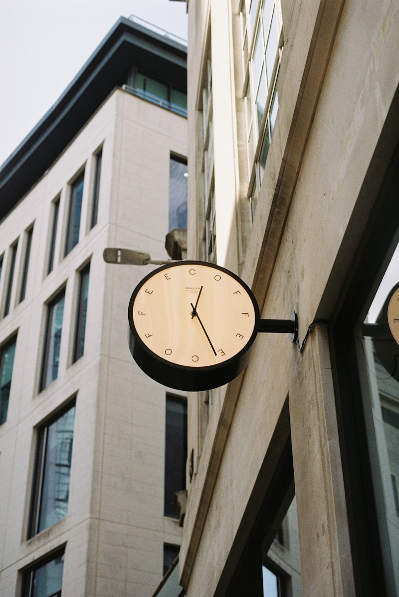 Clock mounted on a building facade.