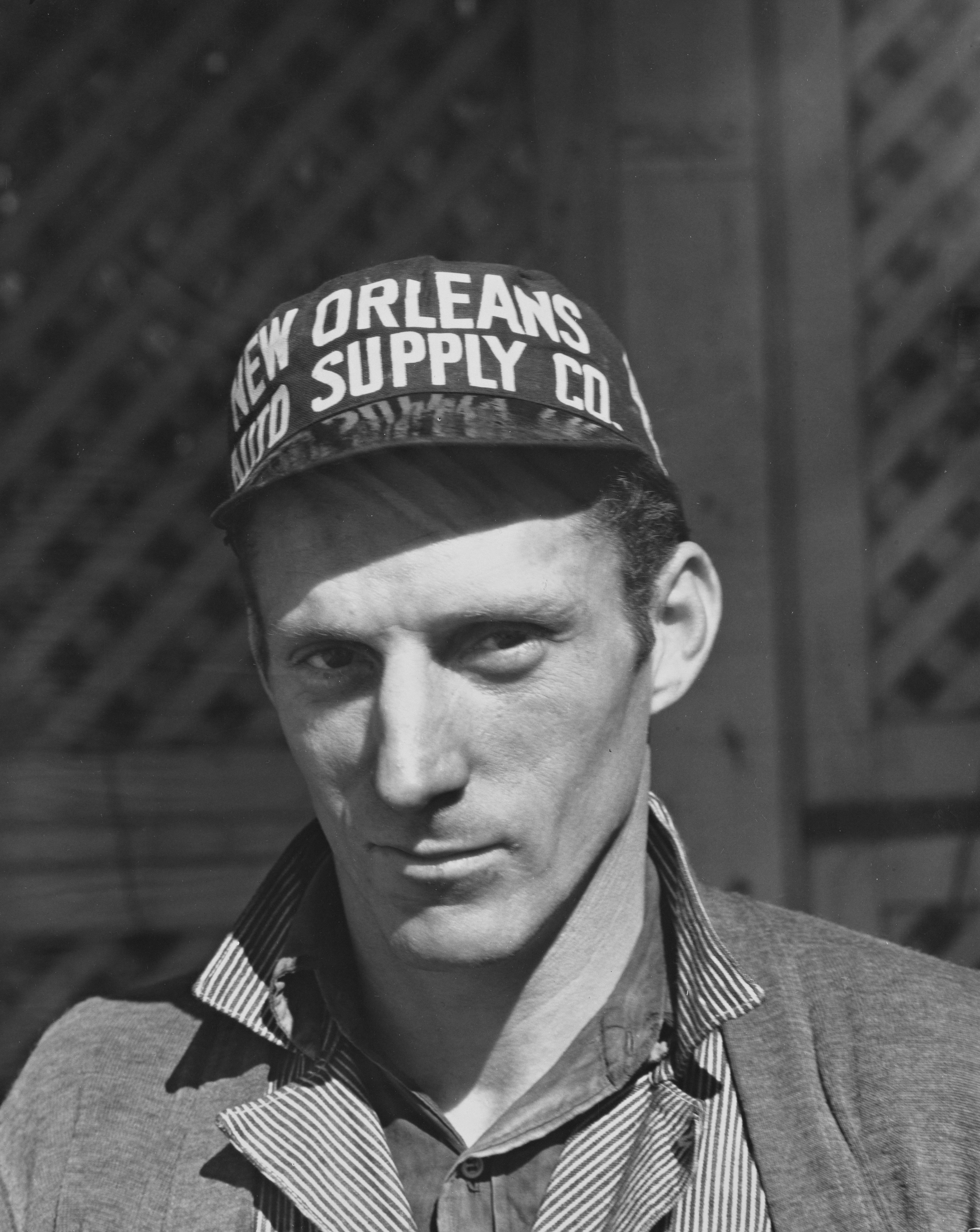 Man wearing a new orleans supply co. hat