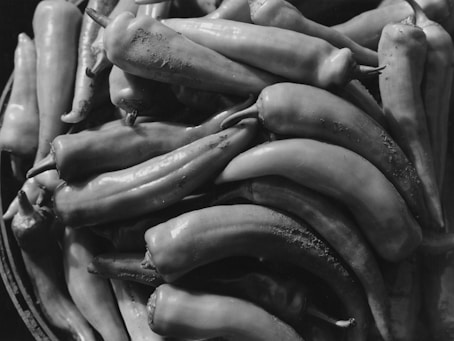 A pile of pale green peppers