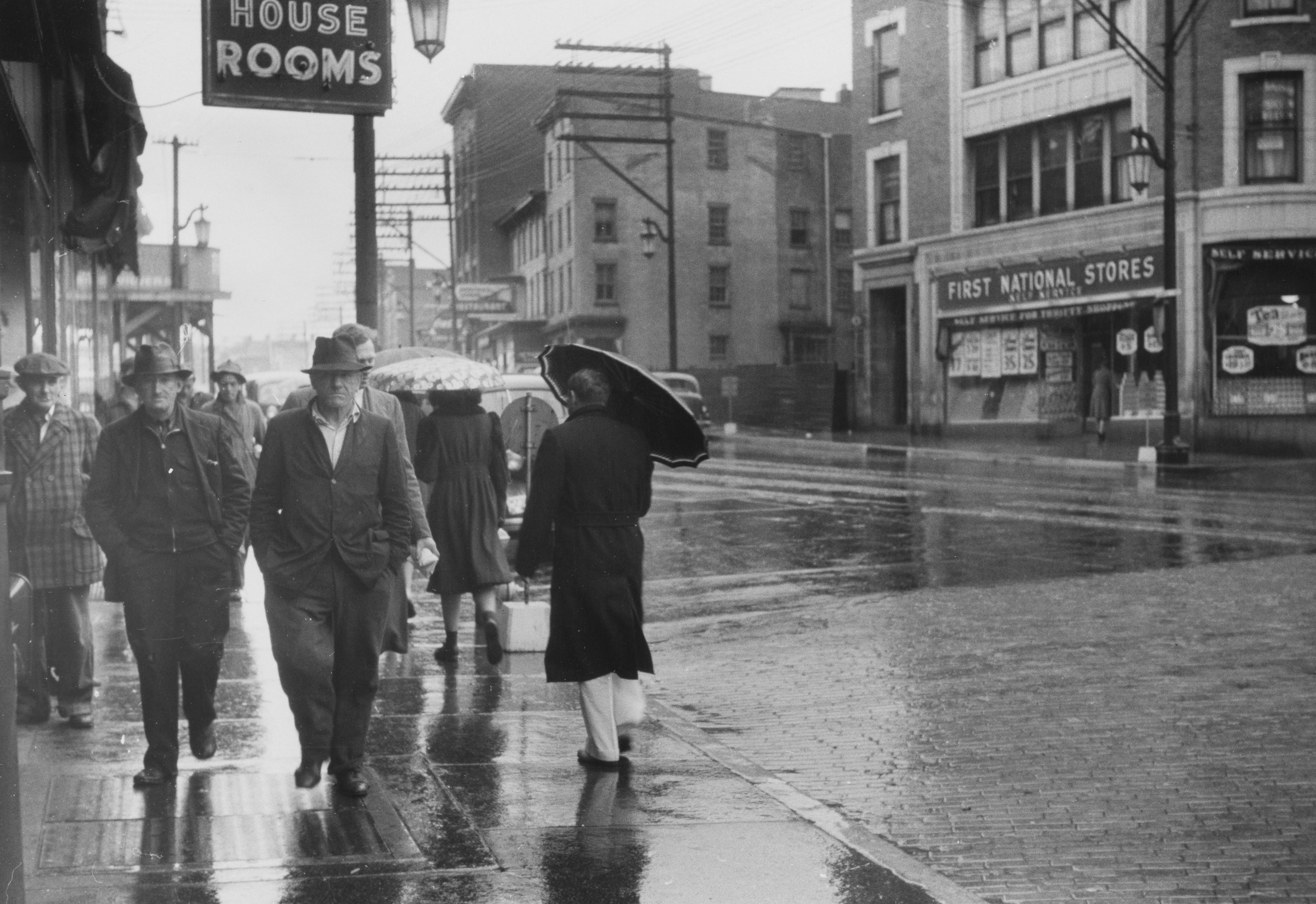 The Miriam and Ira D. Wallach Division of Art, Prints and Photographs: Photography Collection, The New York Public Library. "Street scene on a rainy day in Norwich, Connecticut." The New York Public Library Digital Collections. 1940. https://digitalcollections.nypl.org/items/037efd10-622d-013d-776d-0242ac110005