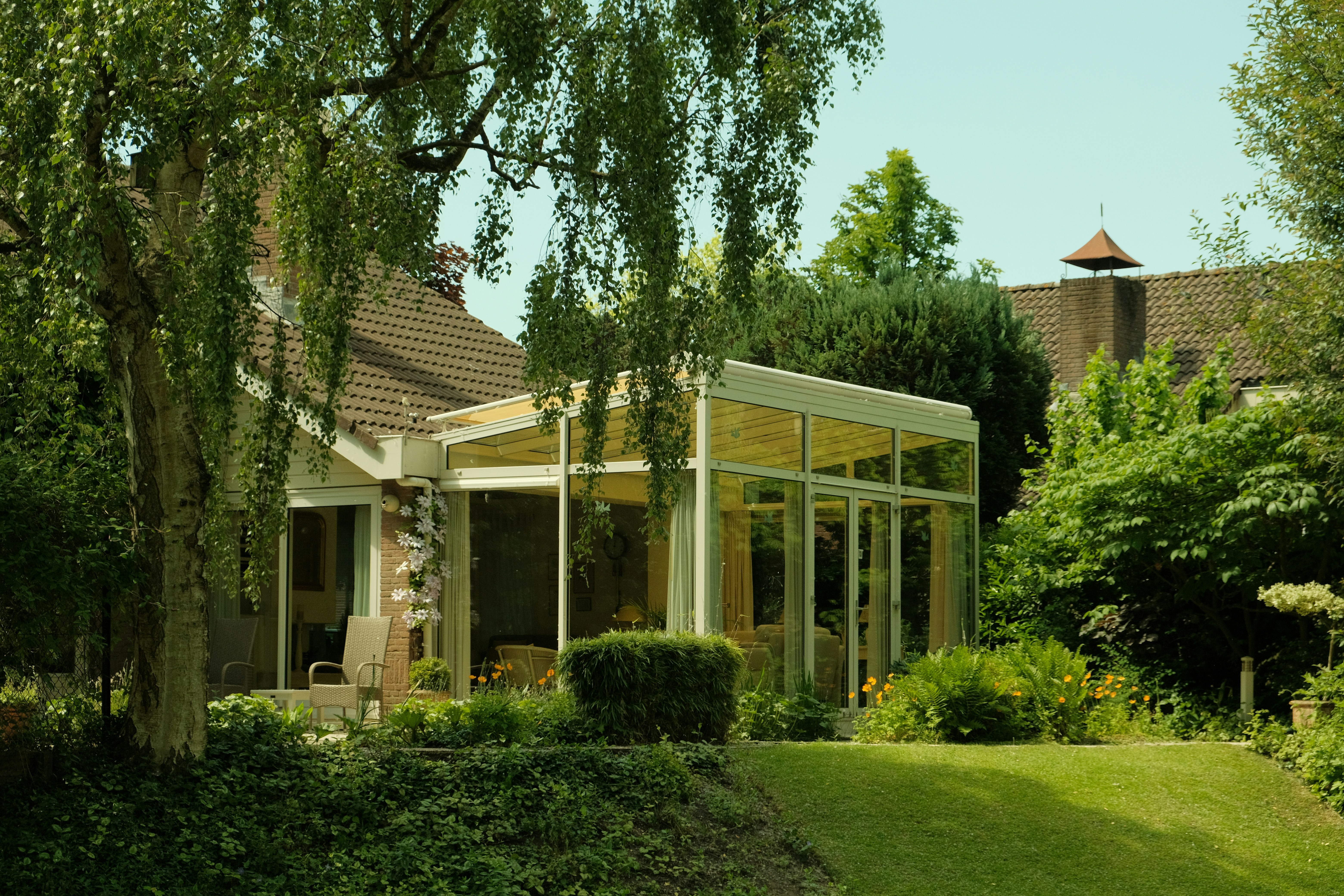 Modern sunroom with trees