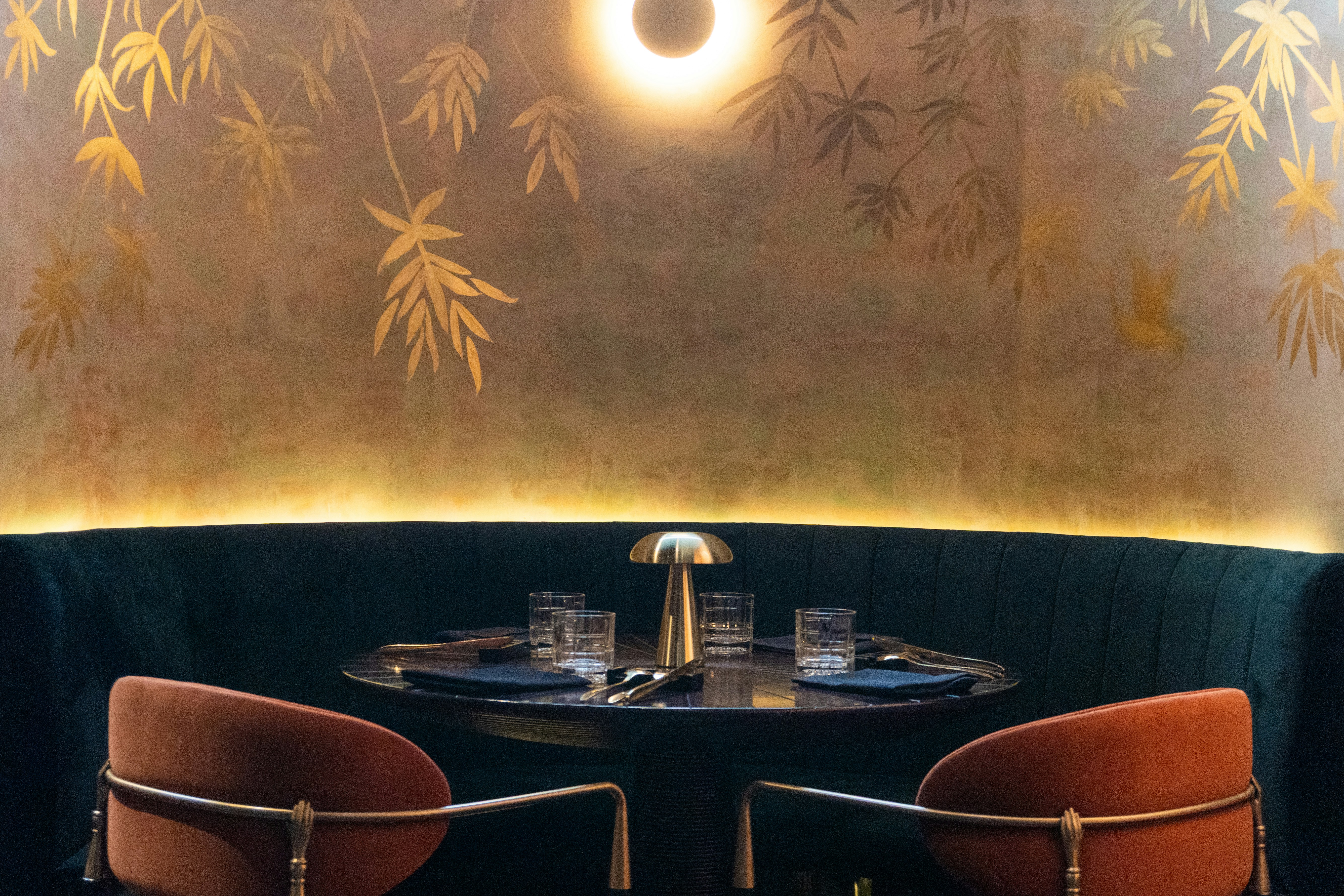 Restaurant booth with table set for two