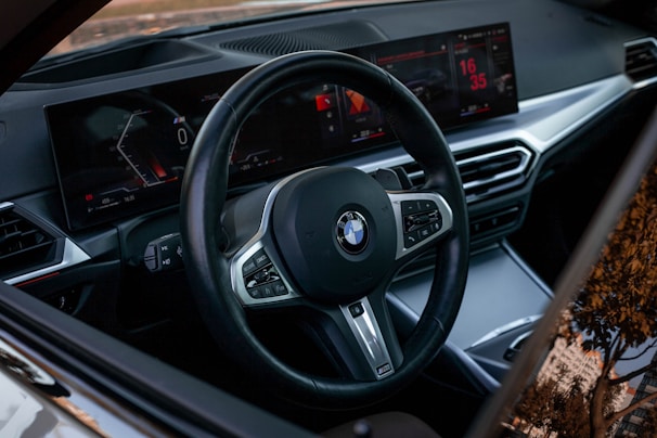 Modern car interior with digital dashboard and steering wheel