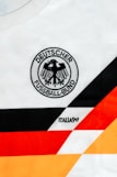 Close-up of a german football jersey with crest.