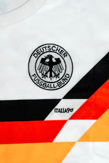 Close-up of a german football jersey with crest.