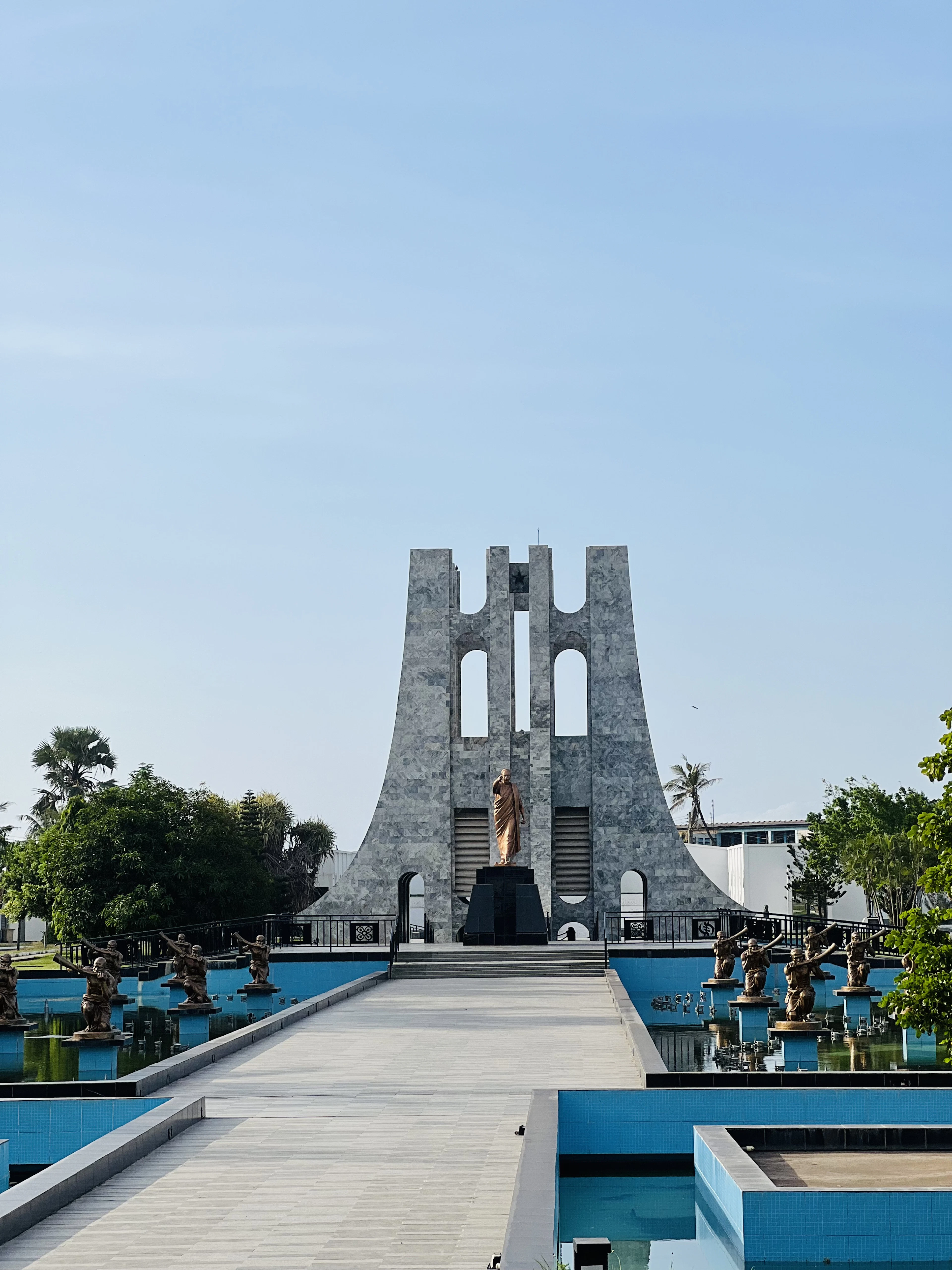 The Kwame Nkrumah Memorial standing among palms, Accra