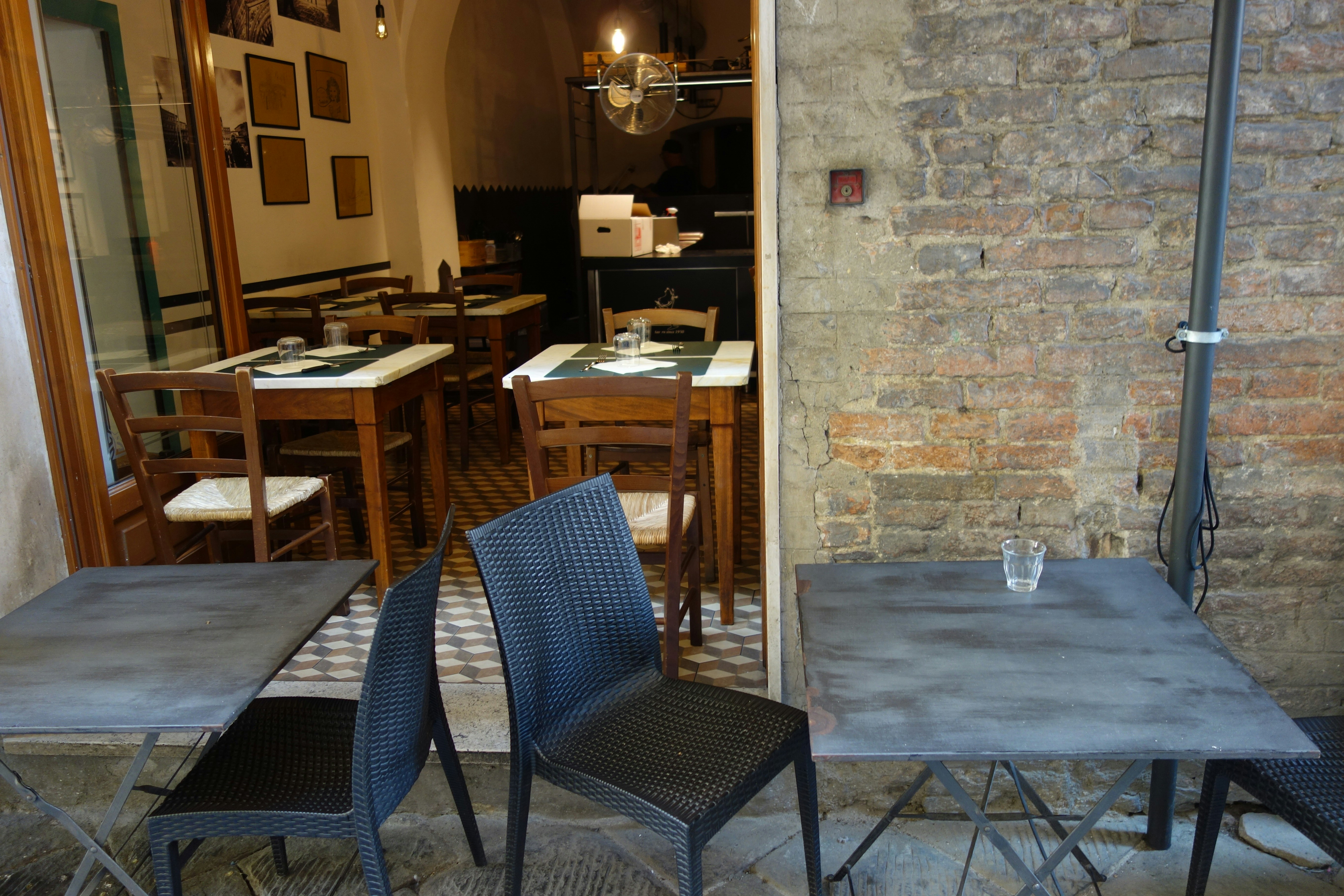 Outdoor tables and chairs outside a restaurant