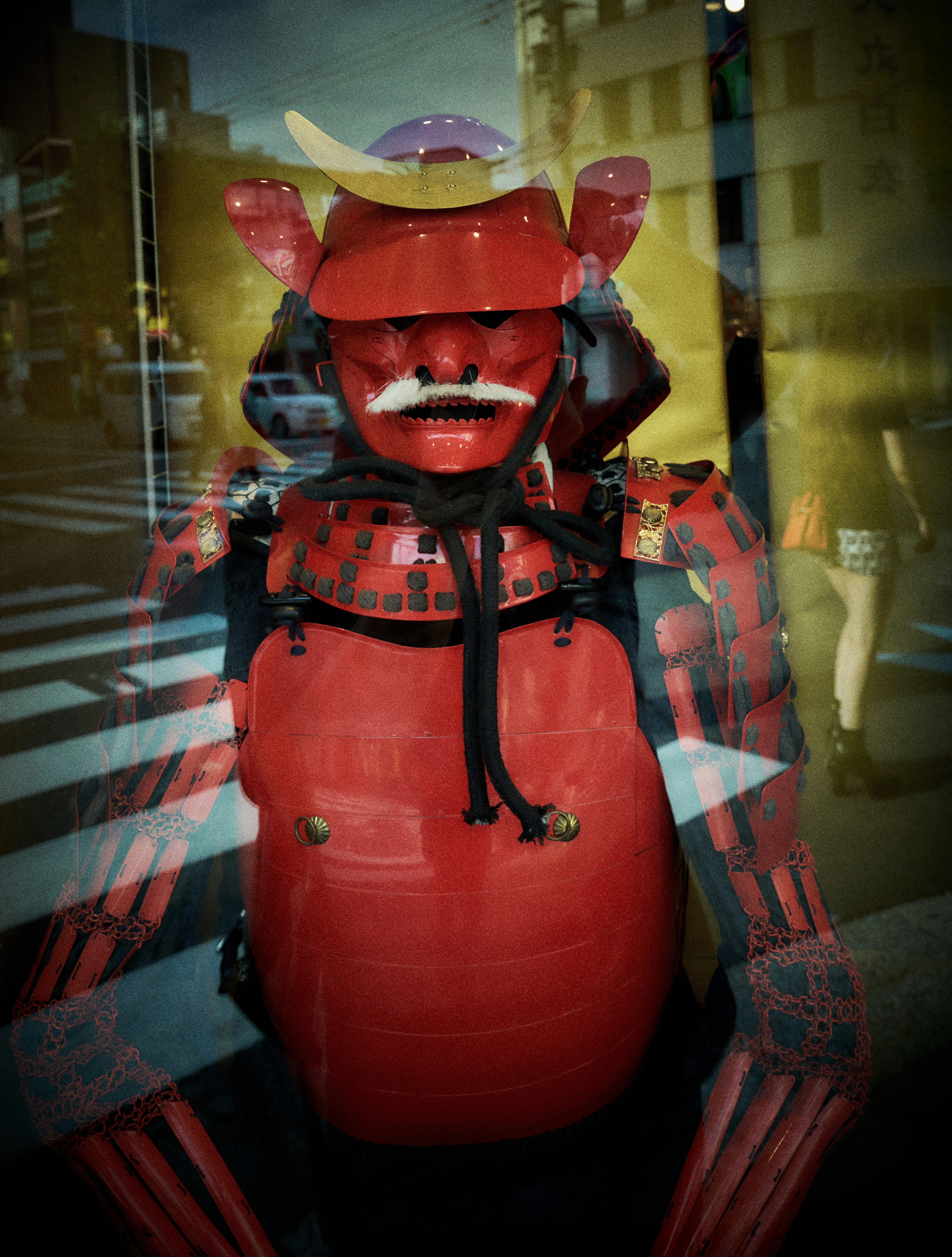 Red samurai armor with a white mustache displayed mustache
