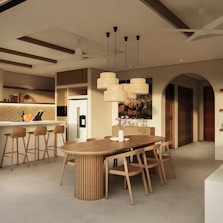 Modern dining room and kitchen with wooden furniture.