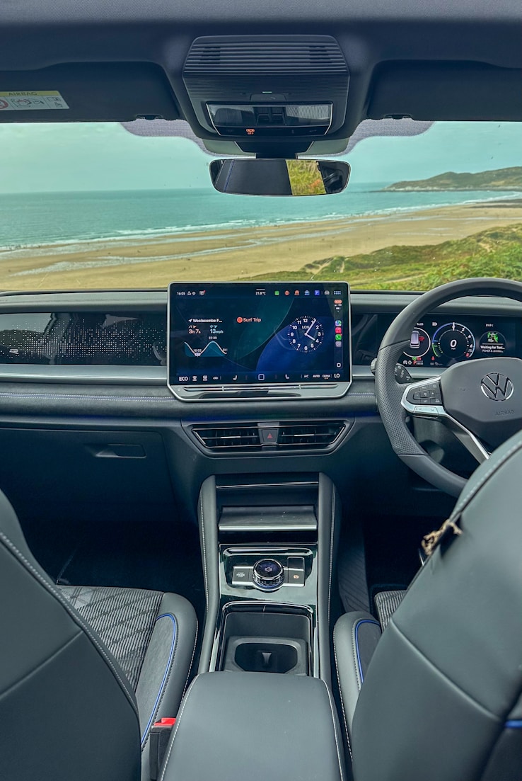 Car interior with ocean view through windshield