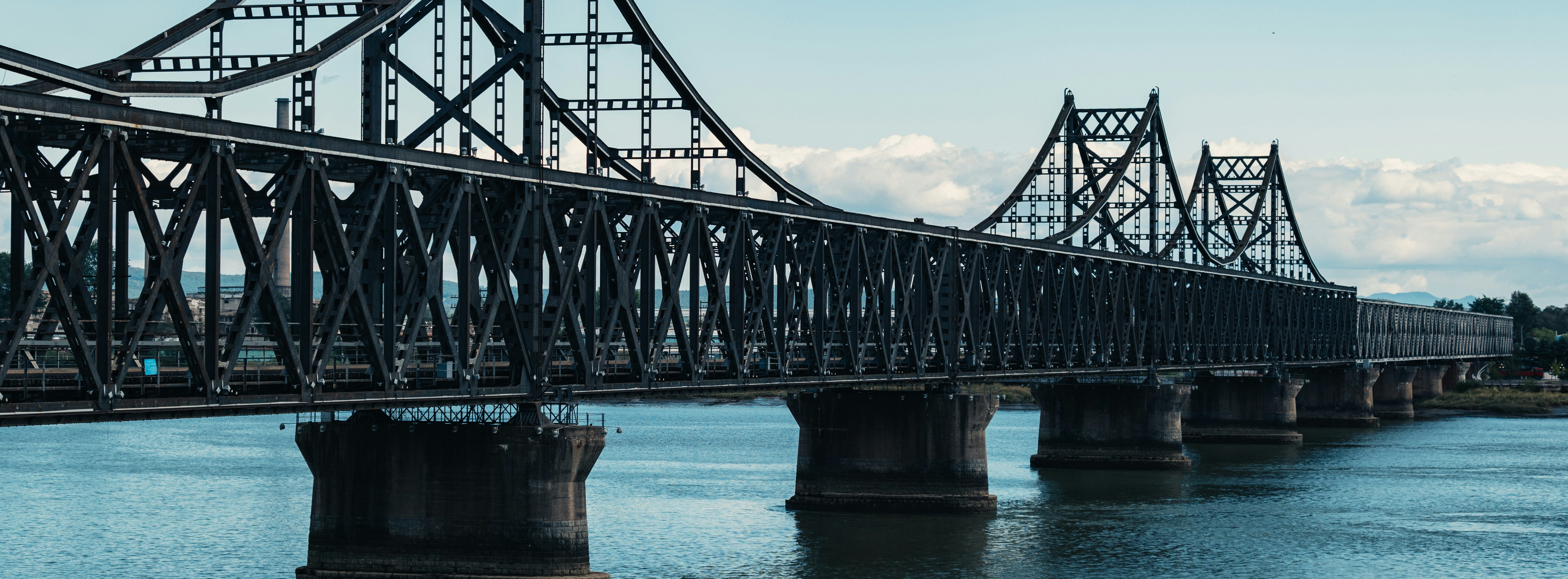 Metal bridge over river