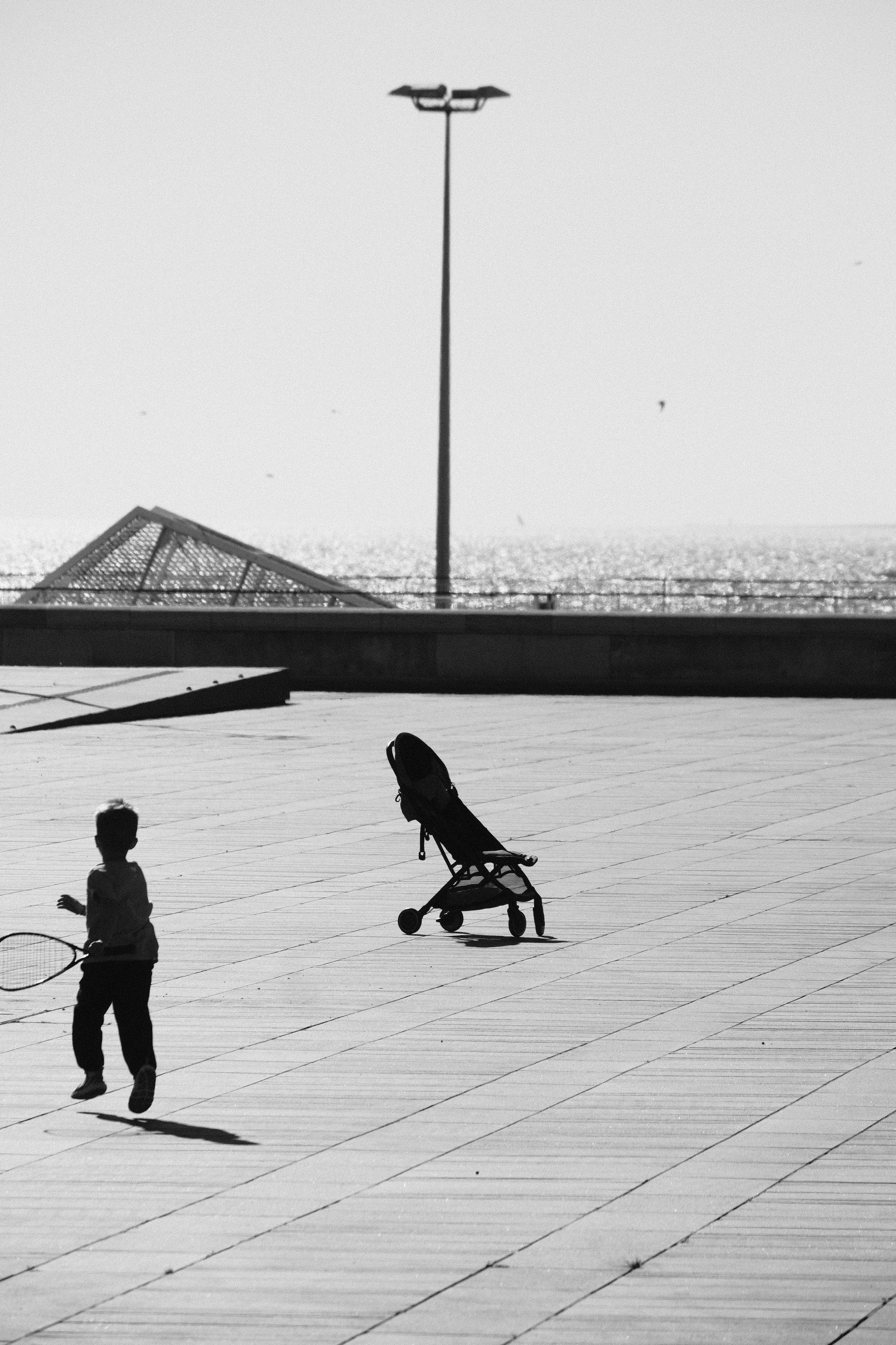 family playing tennis