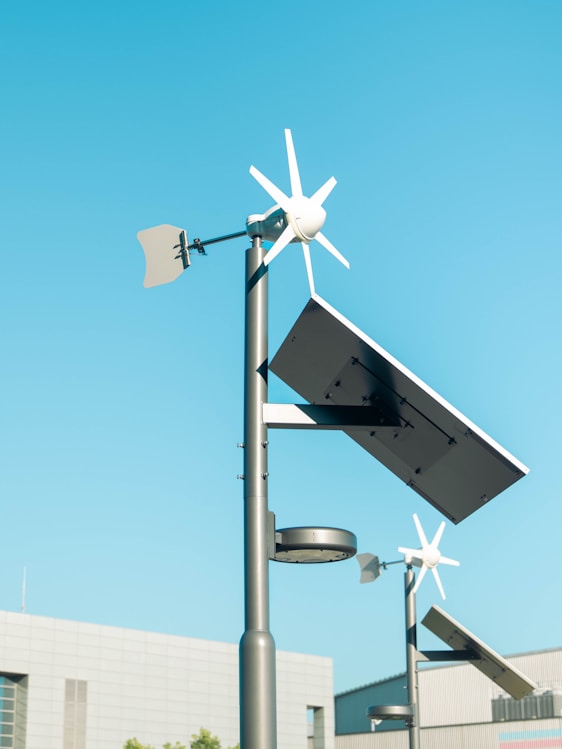Streetlight with solar panel and wind turbine