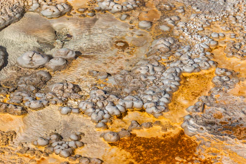 Mineral formations in a geothermal area with colorful deposits