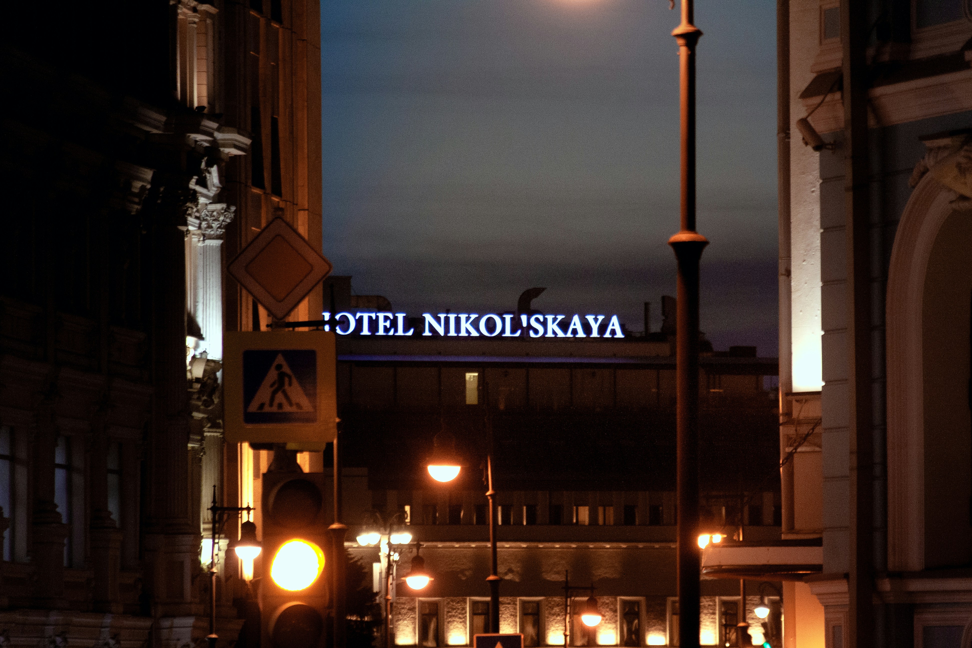 colonial hotel lit up at night in kandy