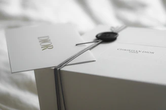 Dior gift box with ribbon and tag