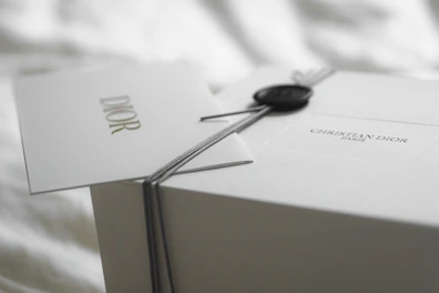 Dior gift box with ribbon and tag