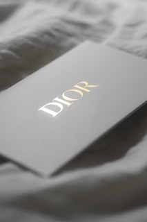 Dior logo on a white card
