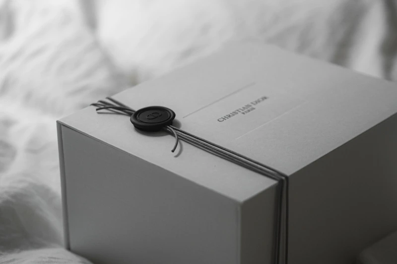 The Safran & Co. signature gift box on a warm wooden surface