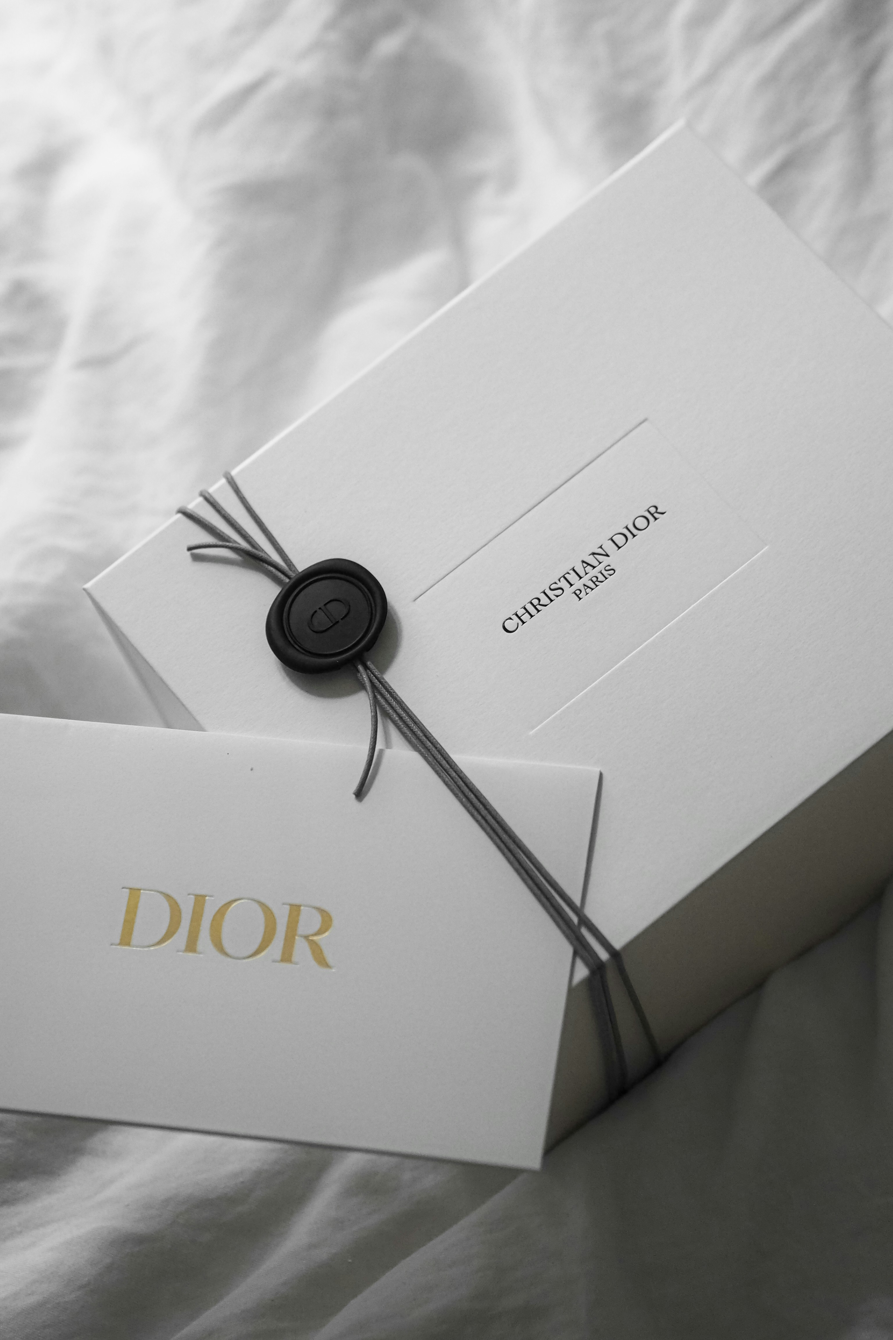 Dior gift box with wax seal and card
