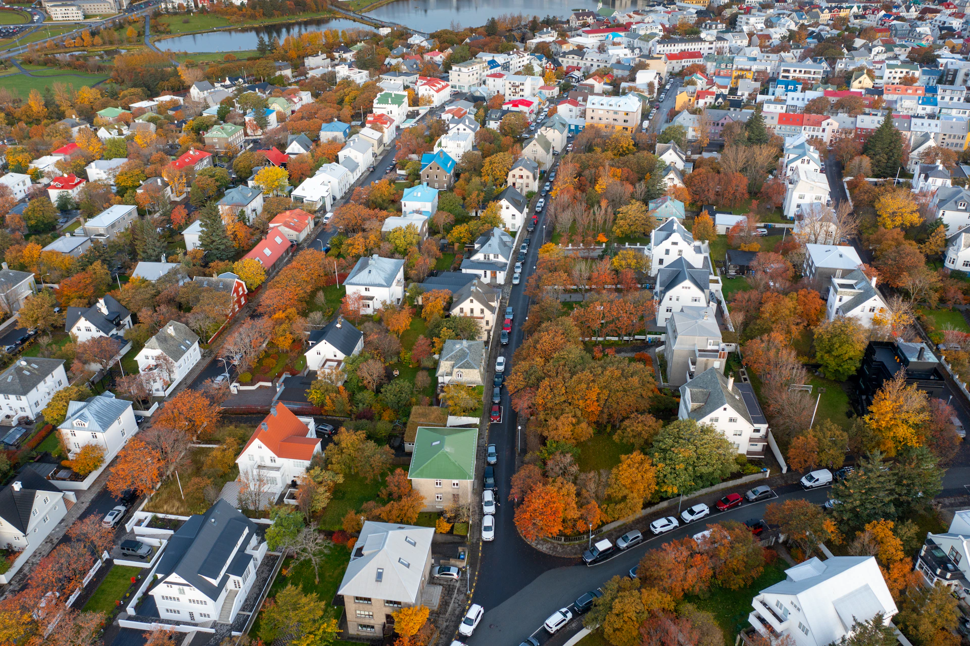 Aerial drone view of a New England residential neighborhood in autumn